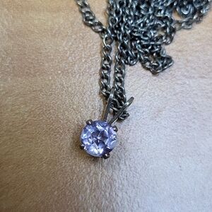 Elegant Silver Necklace with Purple Gemstone